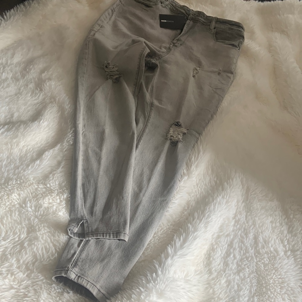 Gray distressed jeans with side leg slits